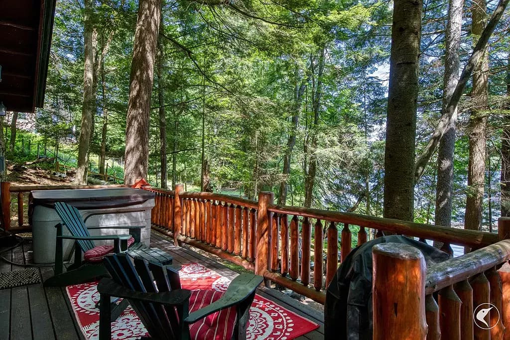 The hot tub deck among the trees at Colden Lodge
